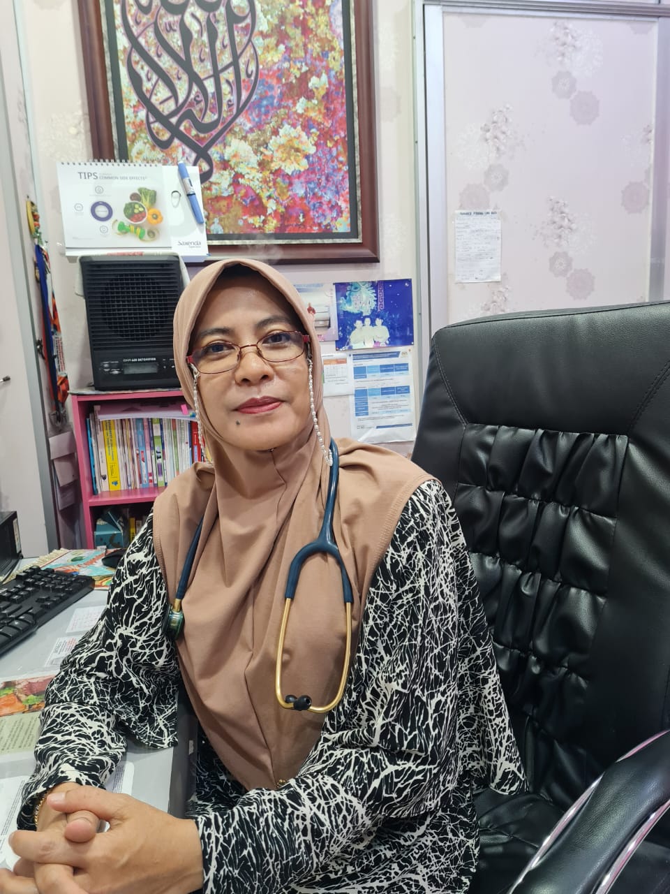 Dr Marisa Amilia